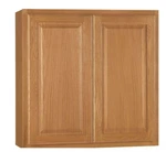 Hampton Bay Medium Oak Raised Panel Stock Assembled Wall Kitchen Cabinet. Fixed Price $200.00.